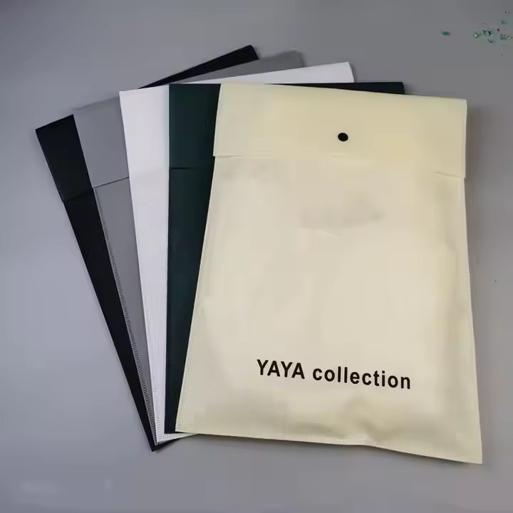 Wholesale Recyclable Multi-Use Customized Non Woven Shopping Bag Dust-proof Button Storage Pouch for Suitcase T-shirts Package