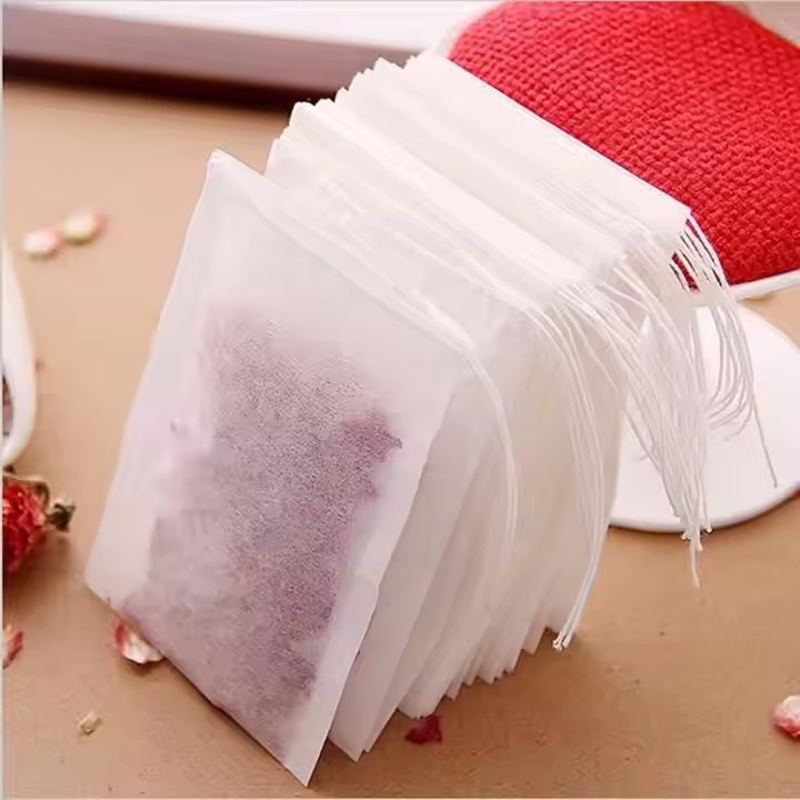 China Hot Stock White Biodegradable Drawstring Empty Filter Paper Custom Tea Bag
