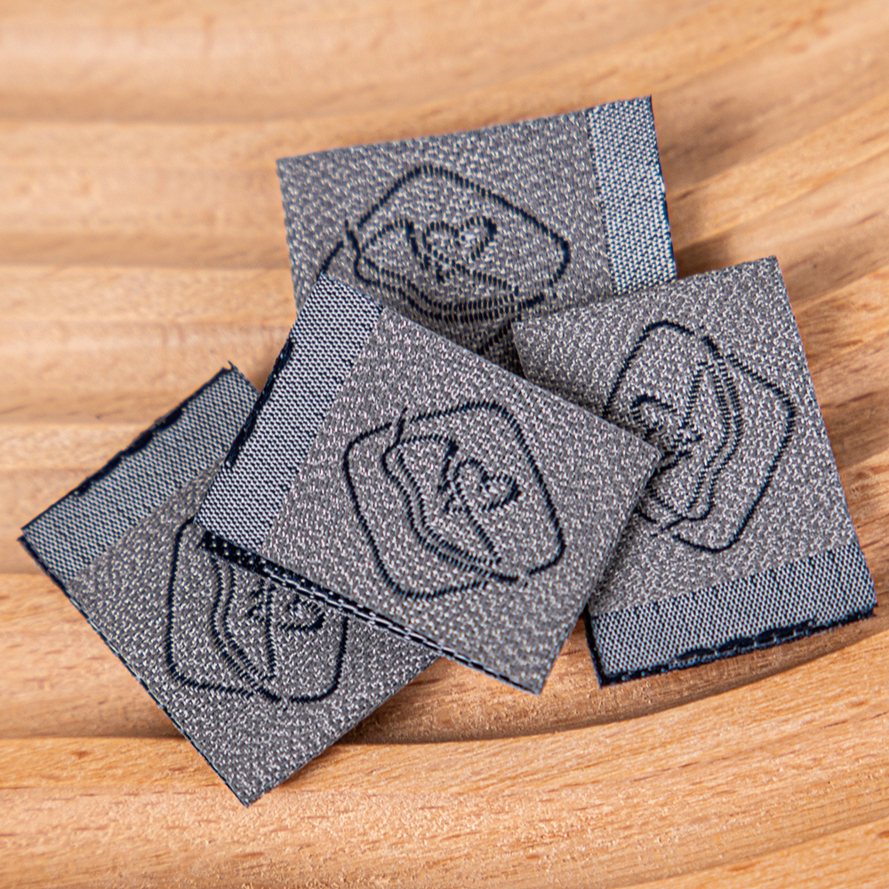  【The Brand Badge on Fabric】Woven Labels—Crafted with Artisanal Precision to Forge the Invisible Ace of Brand Recognition