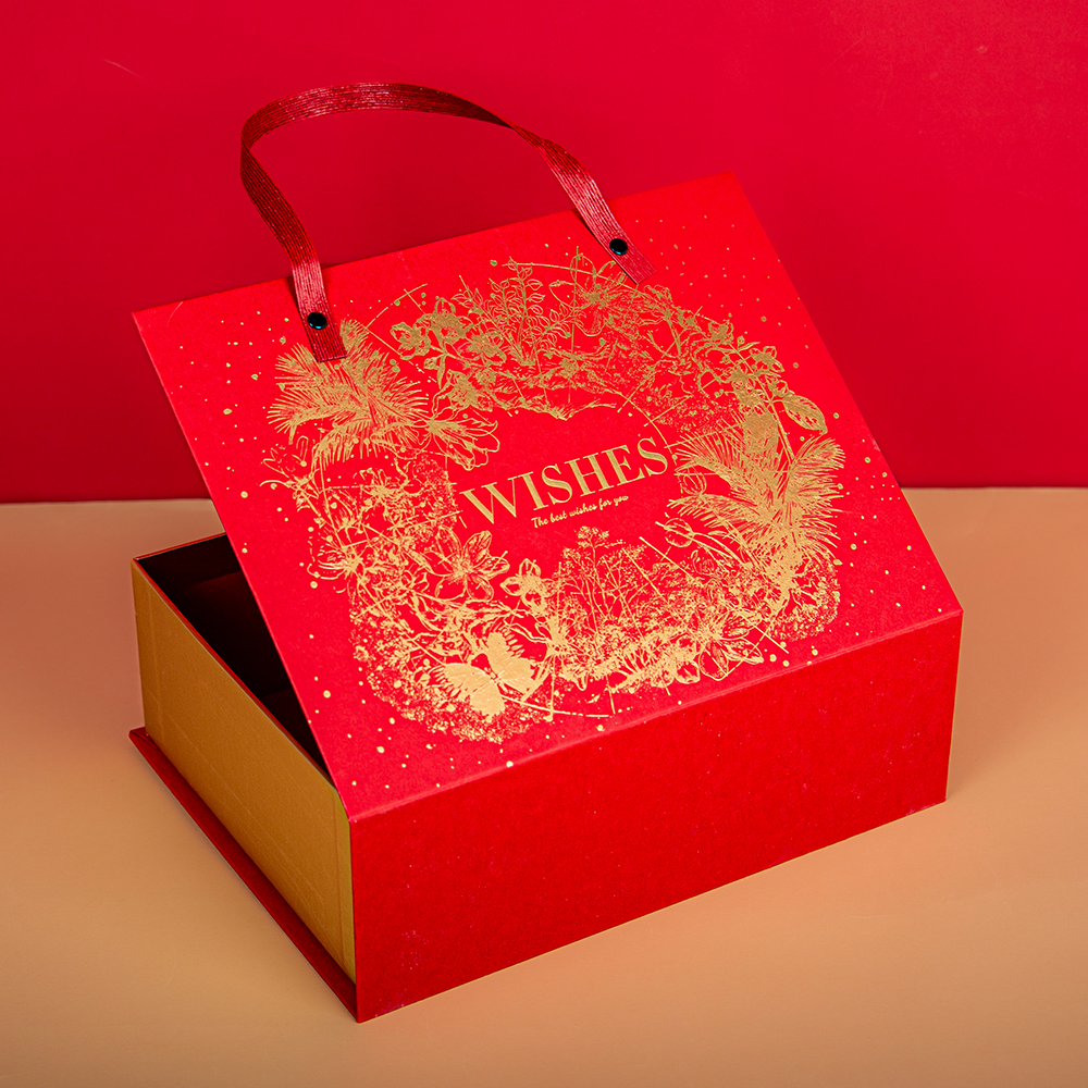 This rose gold handbag-style box holds festive cheer in the palm of your hand