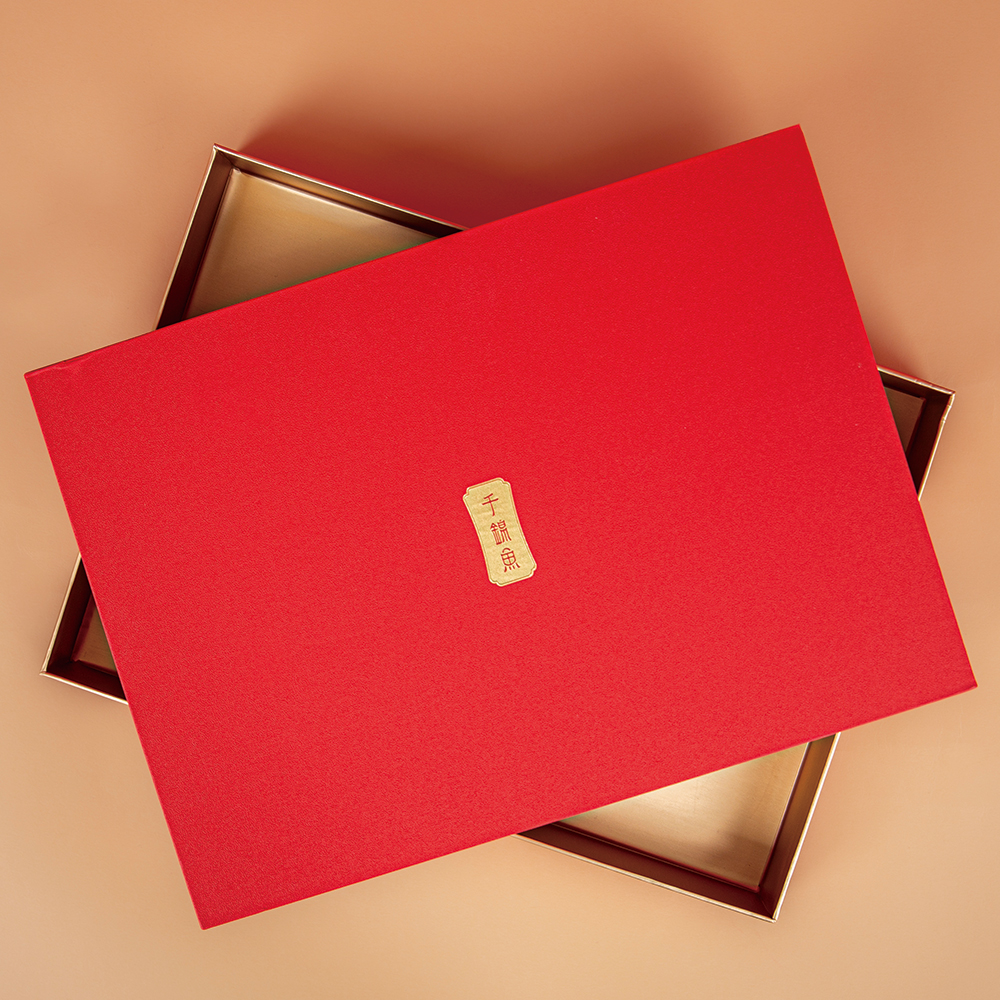 This vermilion lid-and-base box embodies Eastern ritual elegance within its very texture.