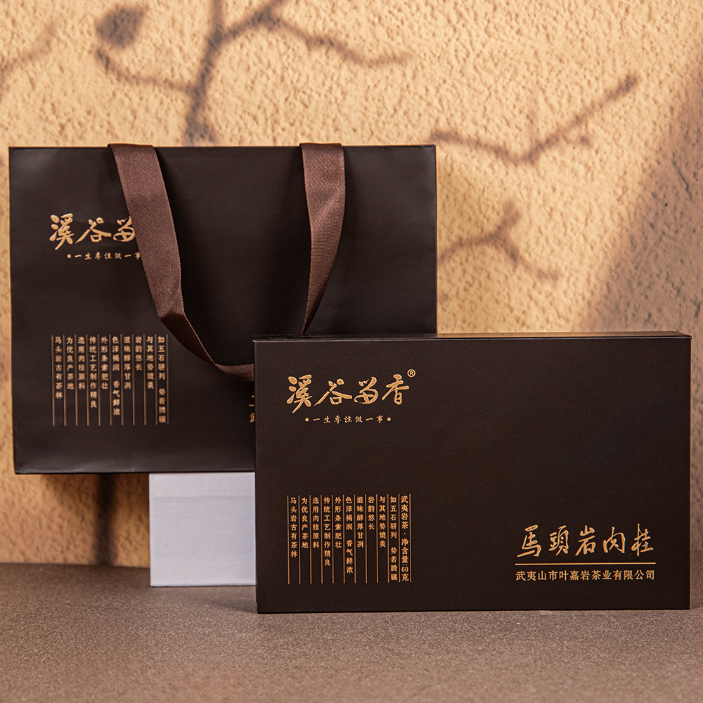 A box filled with the aroma of Tibetan tea, capturing the essence of Wuyi Rock Tea within a compact space