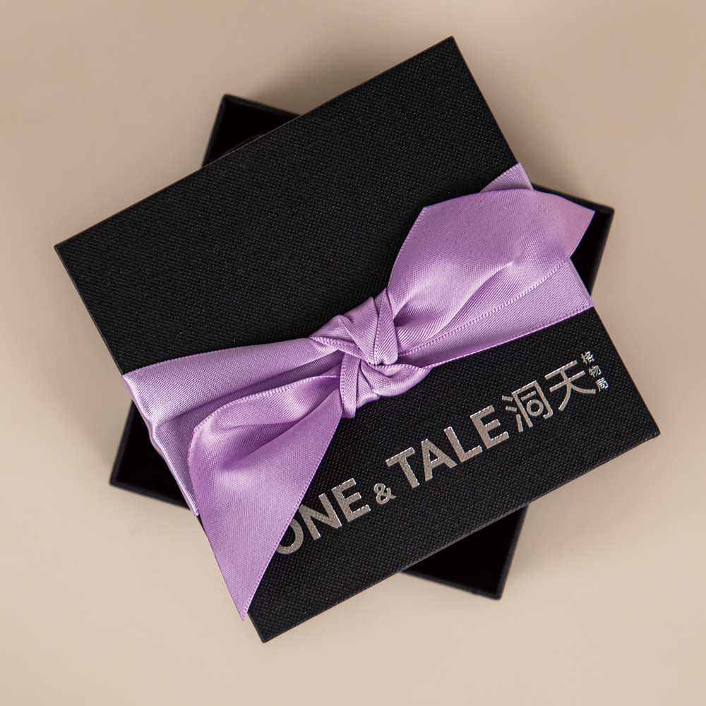 Add a touch of understated sophistication to your gifts with a black box