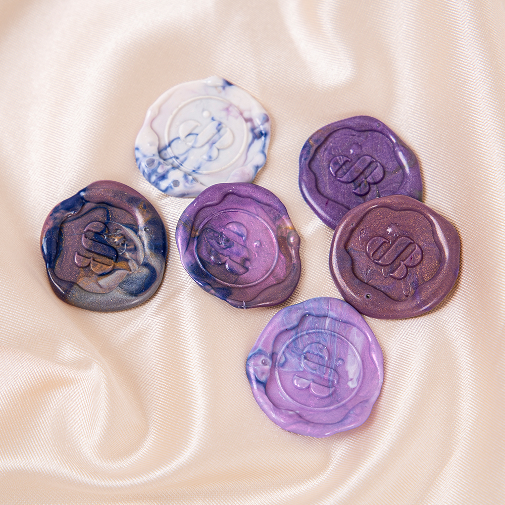 Purple-Toned Sealing Wax Stamps: Preserving a Sense of Gentle Ceremony on Paper