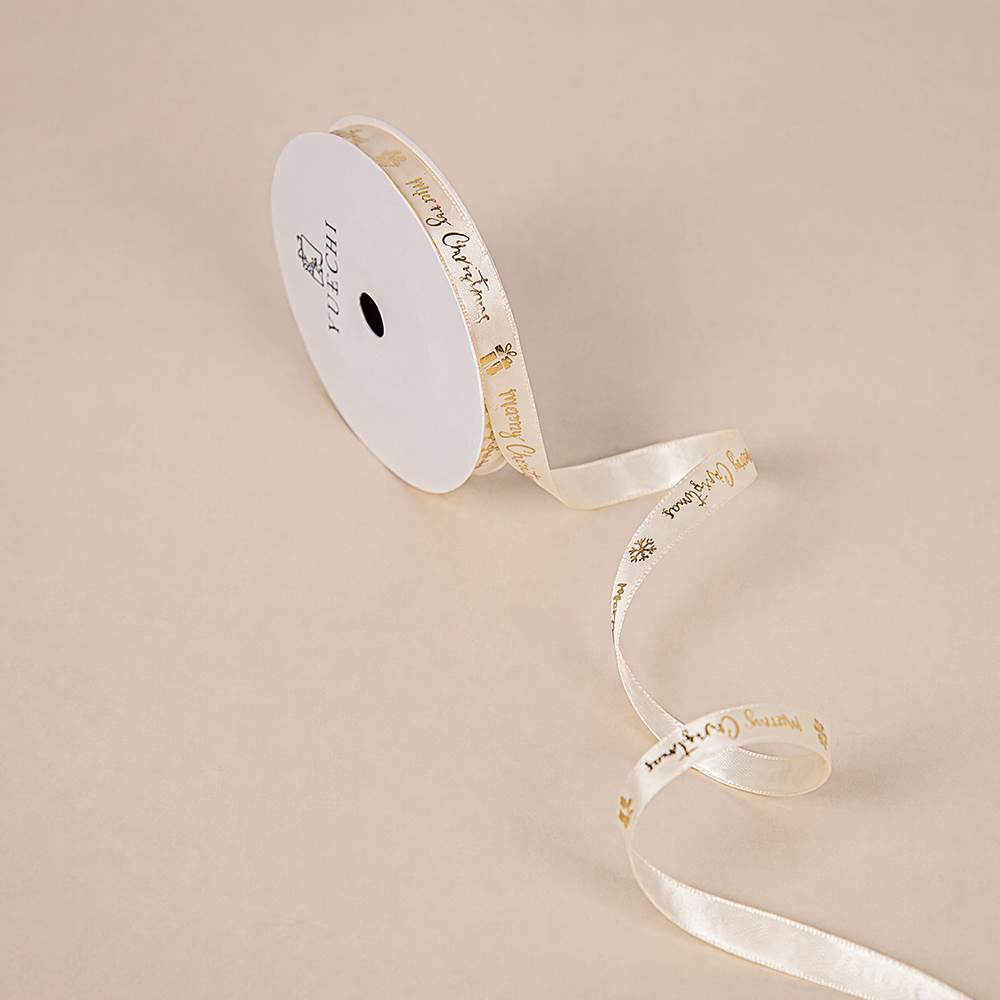 Soft-sheen satin ribbon with gold foil stamping—an exquisite detail hidden within the packaging